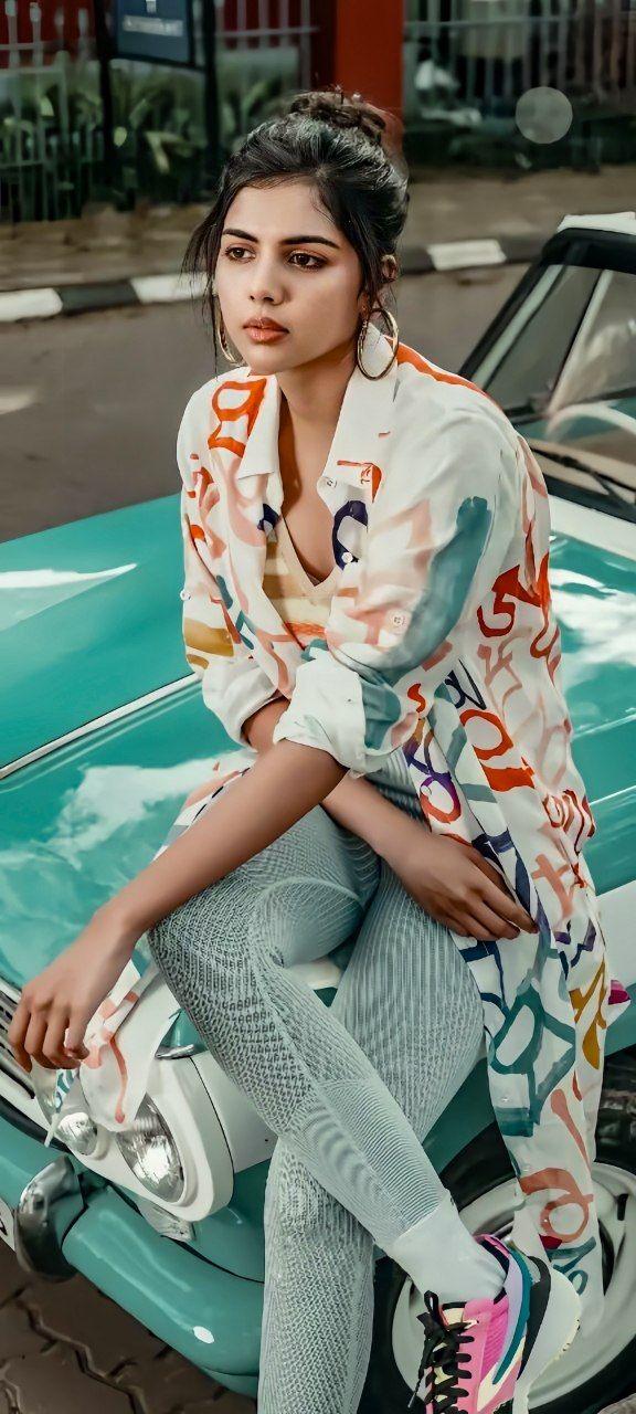 Kalyani Priyadarshan Sitting on Car in Casual Wear Pic