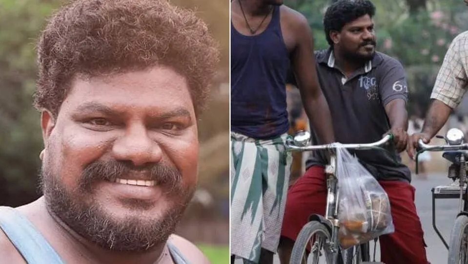 Photo 2 of Aadukalam Murugadoss