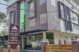 Image of: Delano Residency Budget Stay Near Thirparappu Waterfalls