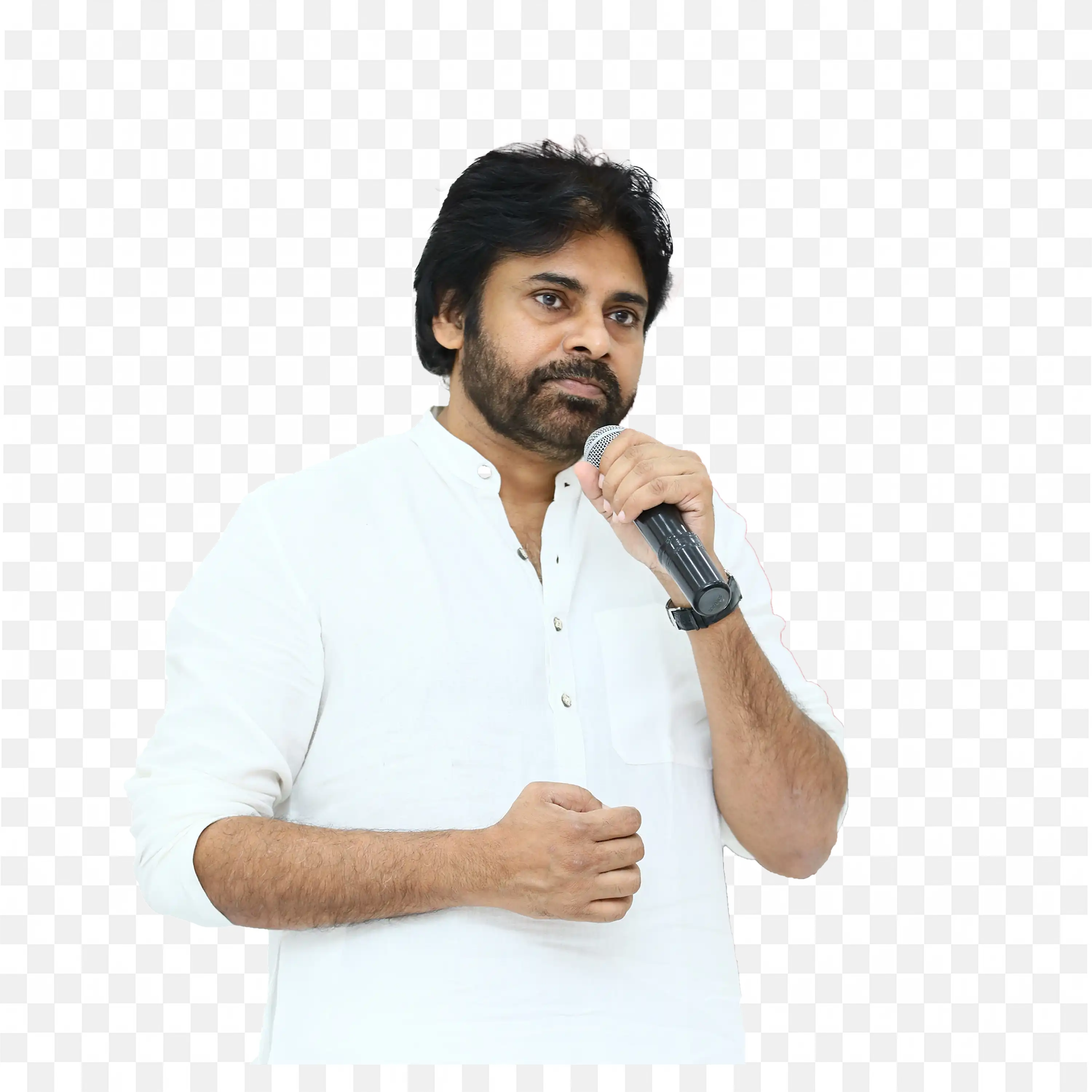 Pawan Kalyan in White Speaking Into the Mic with Confidence
