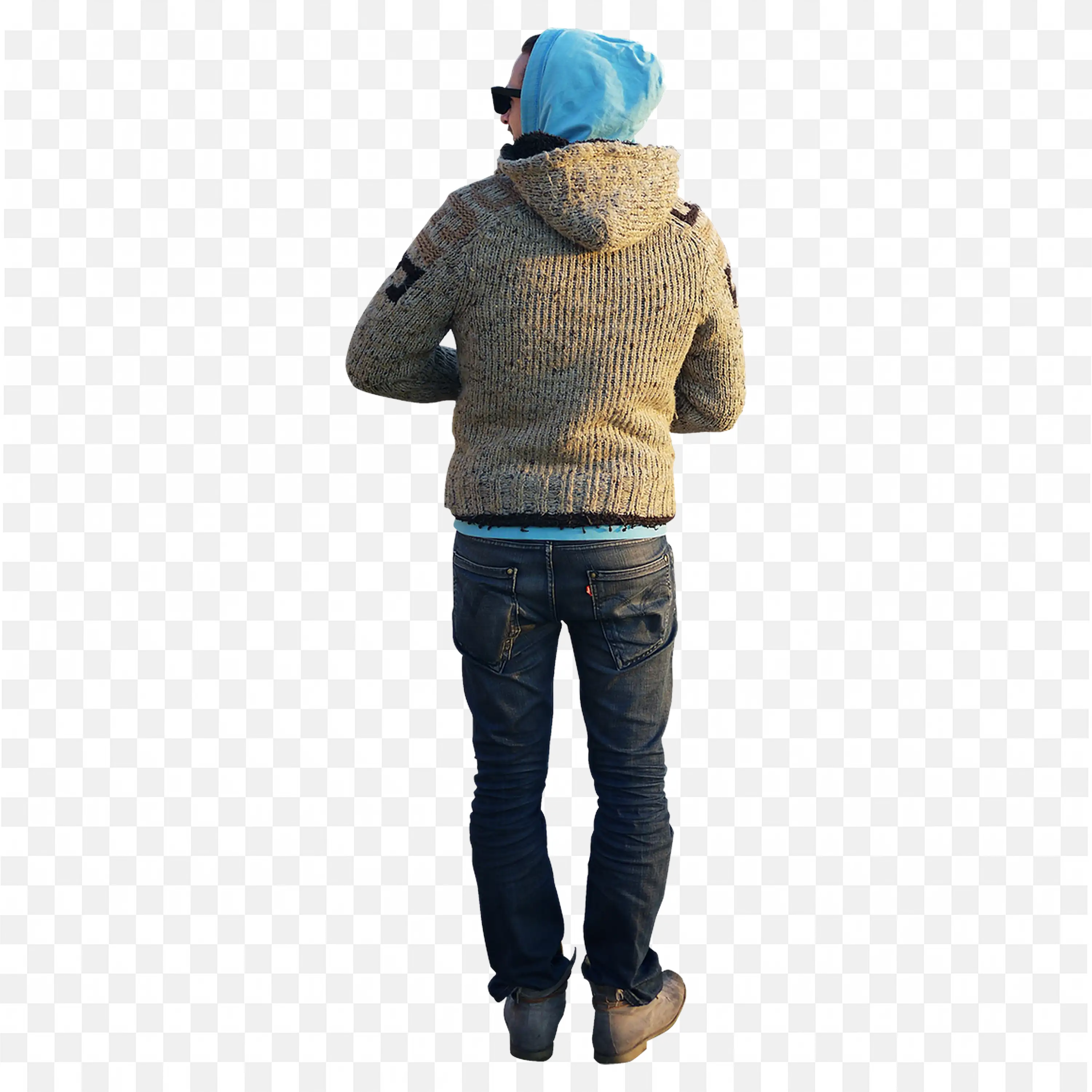 Back View of a Man in a Knit Sweater and Jeans Standing