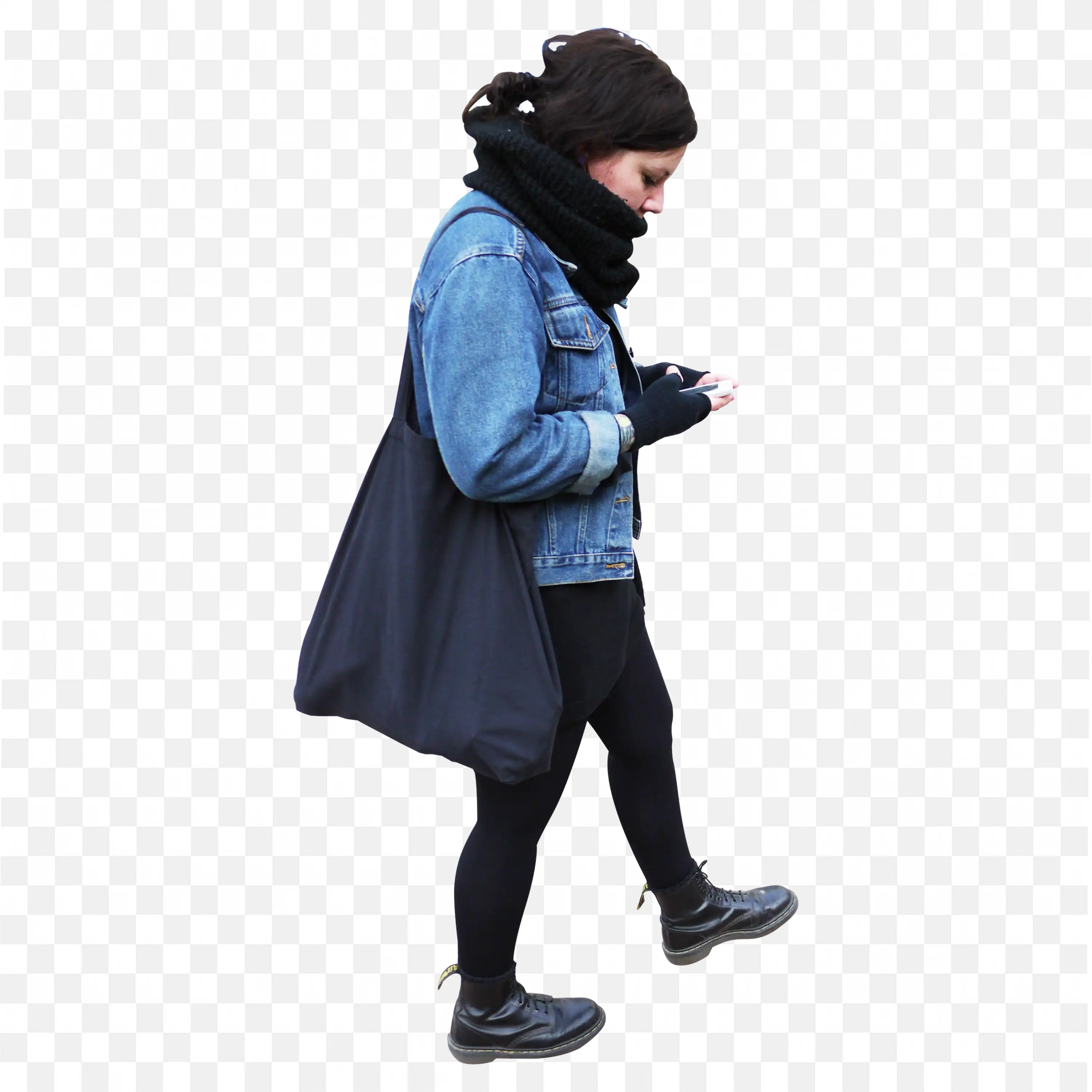 Woman with a Jean Fabric Jacket and Using Phone While Walking