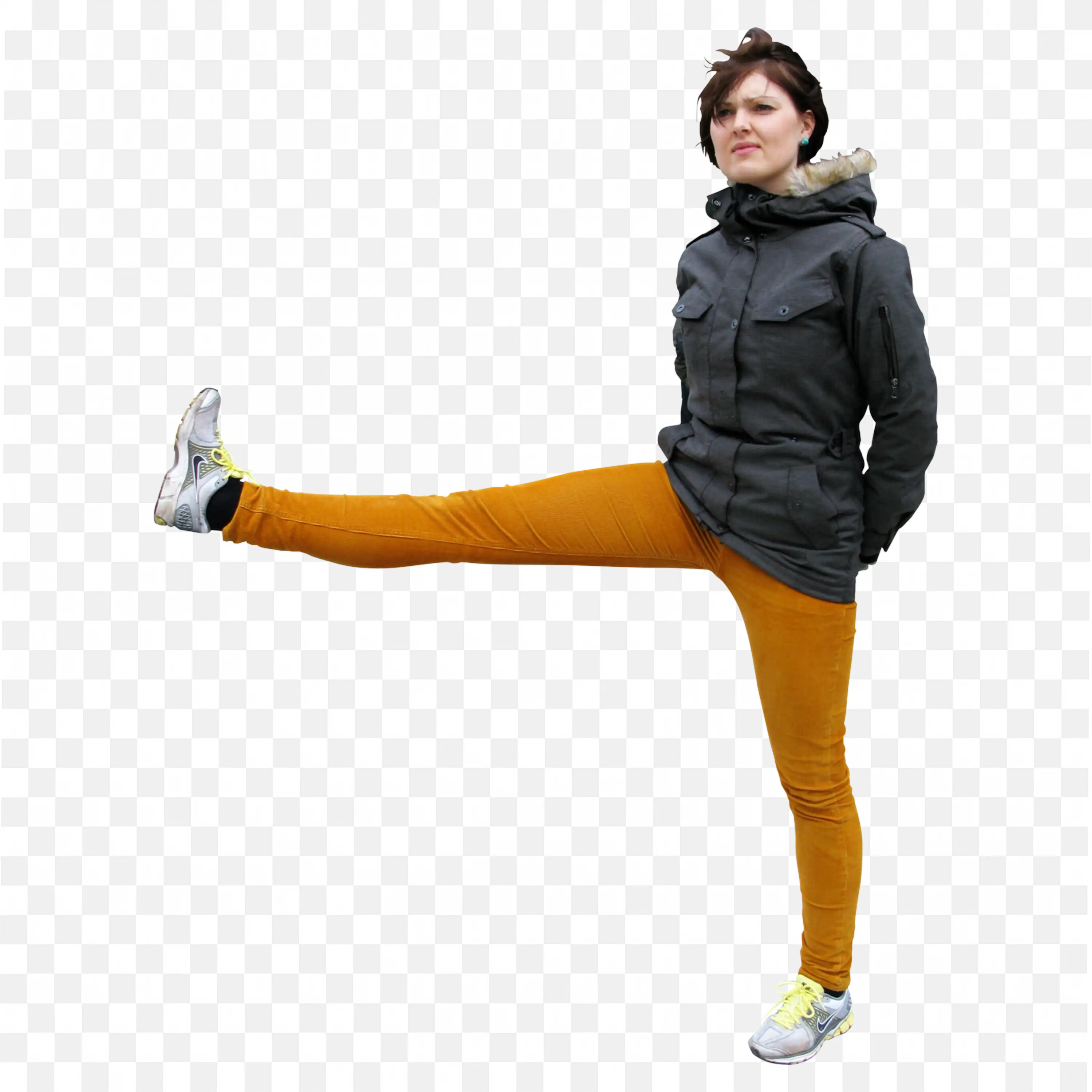 Woman Kicking Leg Pose Wearing Black Jacket and Orange Pants