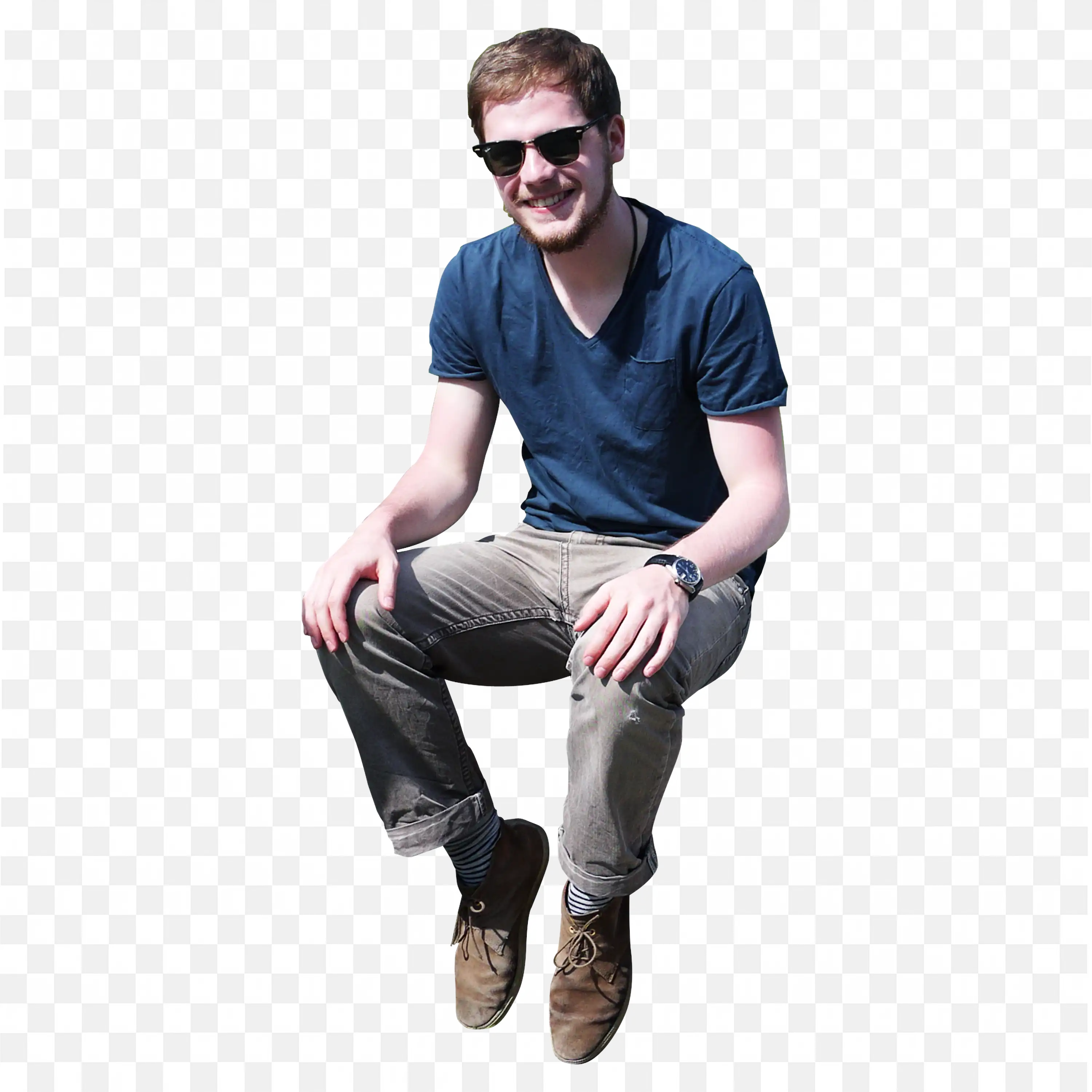 Young Man with Casual Dress and Sunglasses Sitting Outside