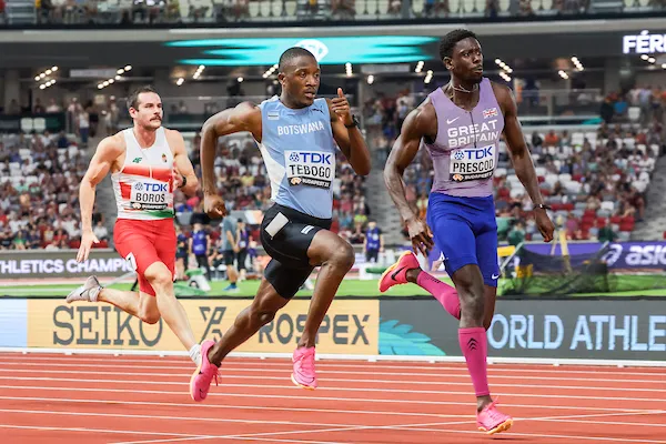 Letsile Tebogo leading in a sprint final with strong determination
