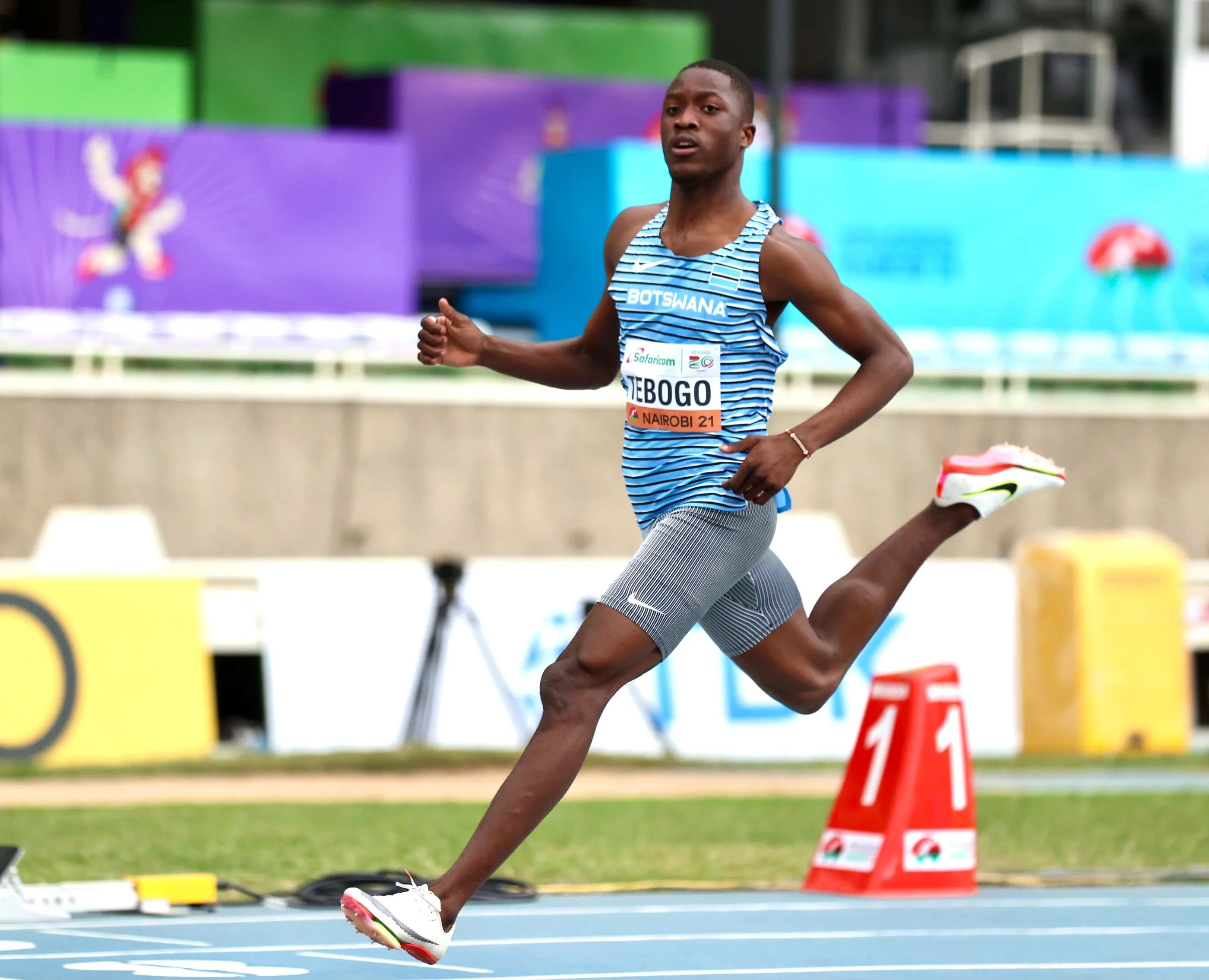 Letsile Tebogo making a leap during athletics competition
