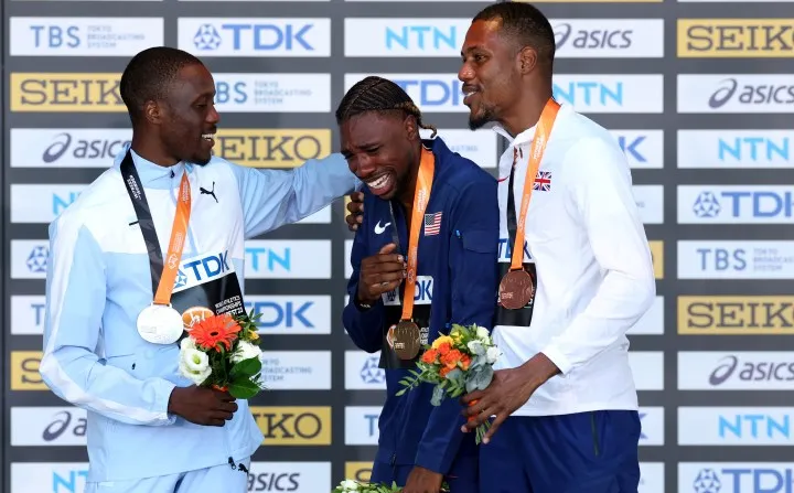 Letsile Tebogo receiving award after outstanding race victory