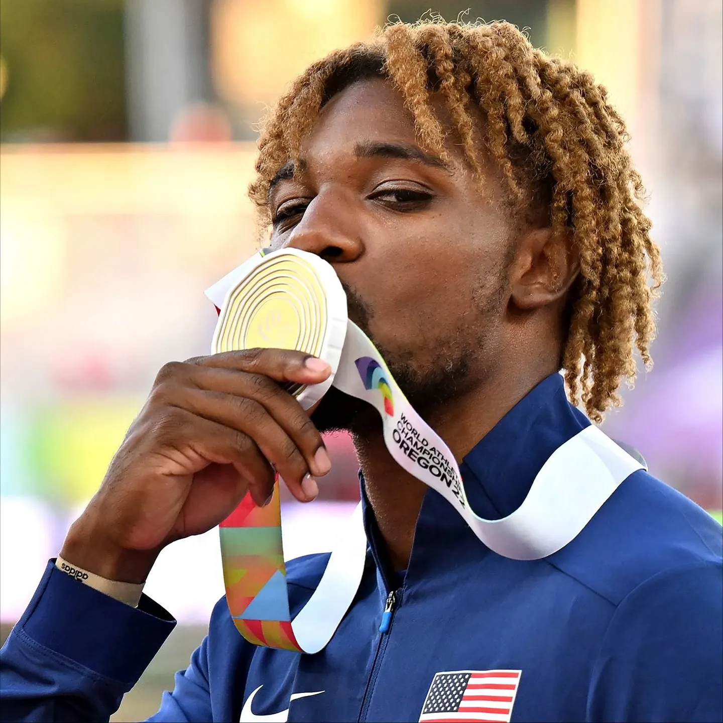 Noah Lyles Kisses Gold Medal on Podium