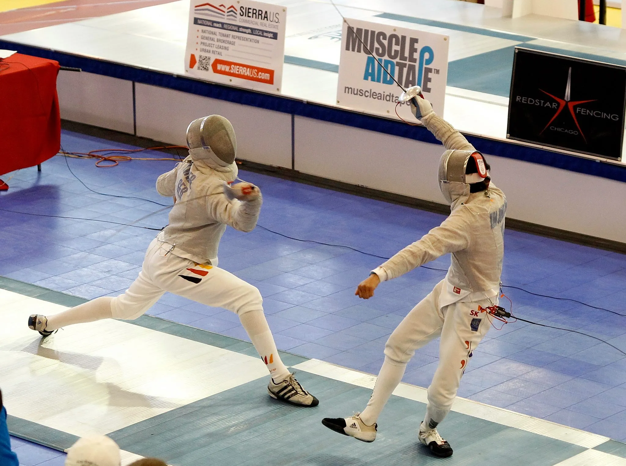 Valentina Vezzali at Full Speed in a Fencing Bout