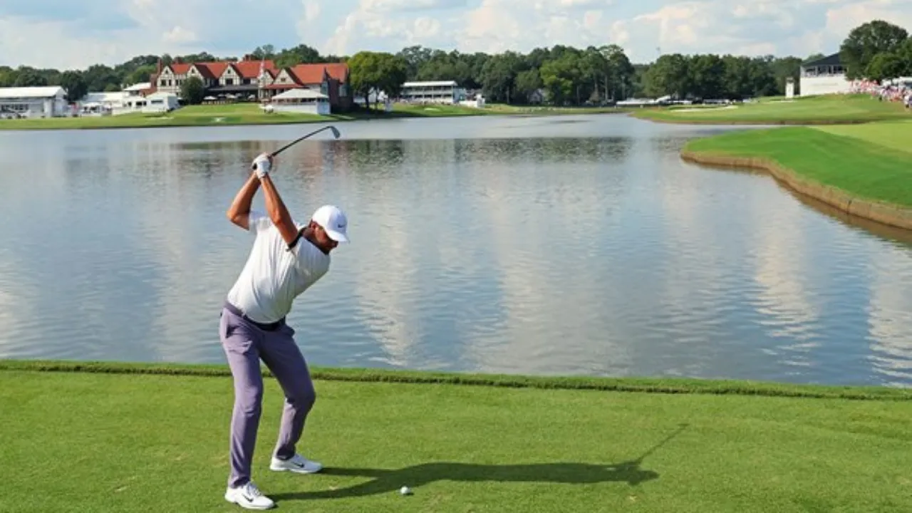 Scottie Scheffler Driving Over Water Hazard