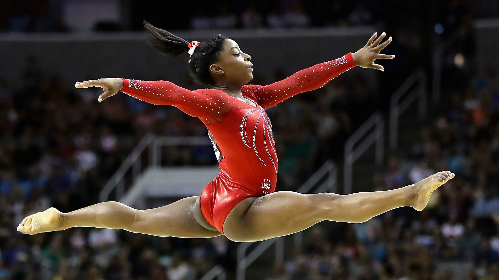 Simone Biles Balance Beam Performance Wallpaper