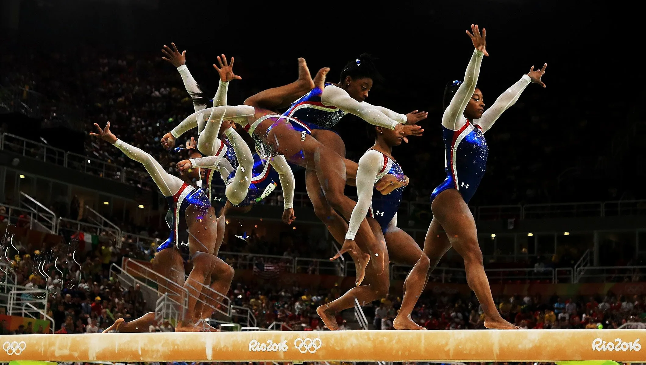 Simone Biles Gymnastics Victory Pose Wallpaper