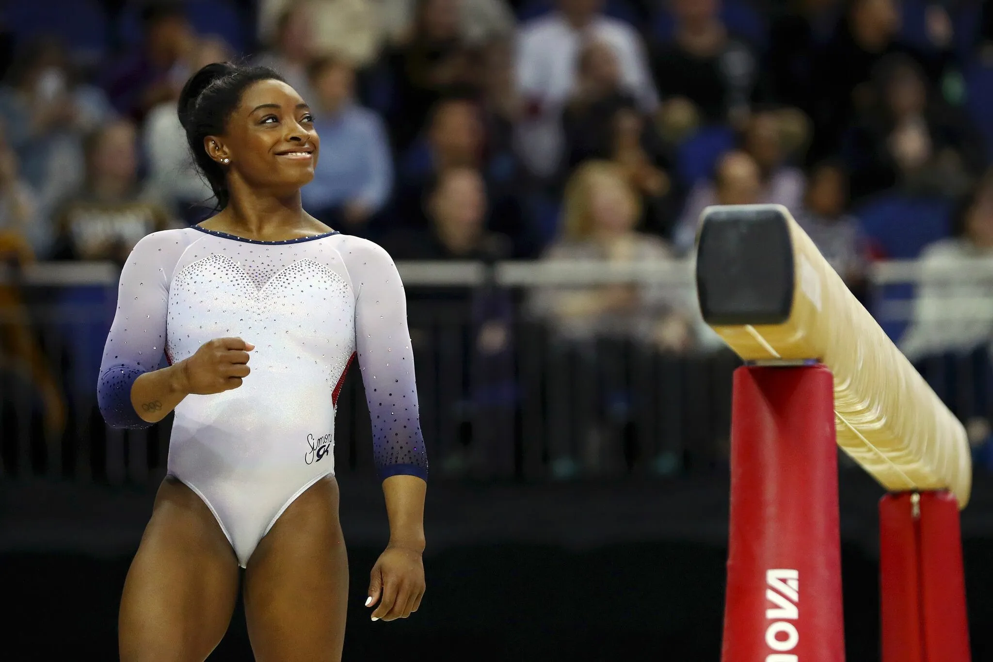 Simone Biles Gymnastics Practice Arena Wallpaper