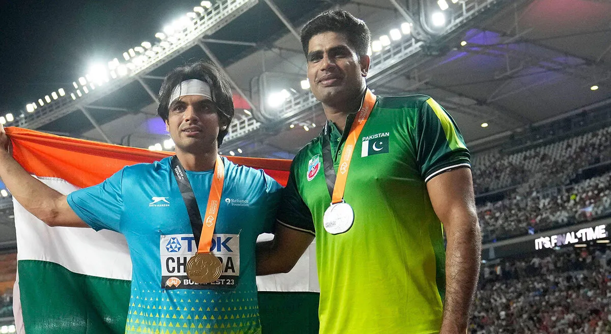 Neeraj Chopra Wearing Mask, Holding Medal Proudly at Olympics