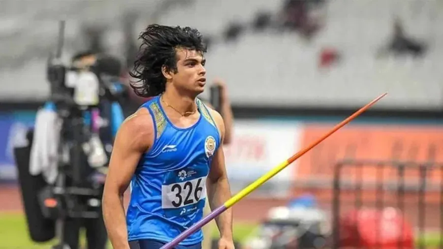 Neeraj Chopra Celebrating Gold Medal with Indian Flag