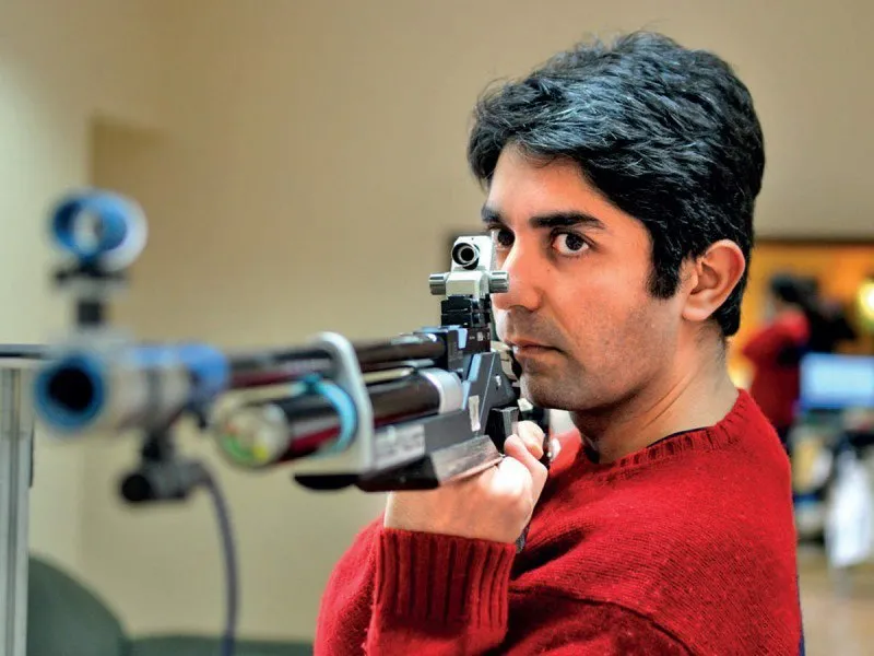 Abhinav Bindra Taking Aim at Shooting Range