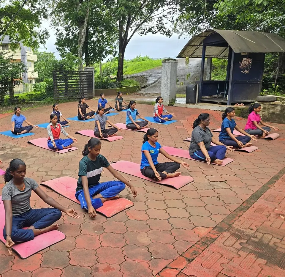 PT Usha’s Academy Students Practicing Yoga Outdoors
