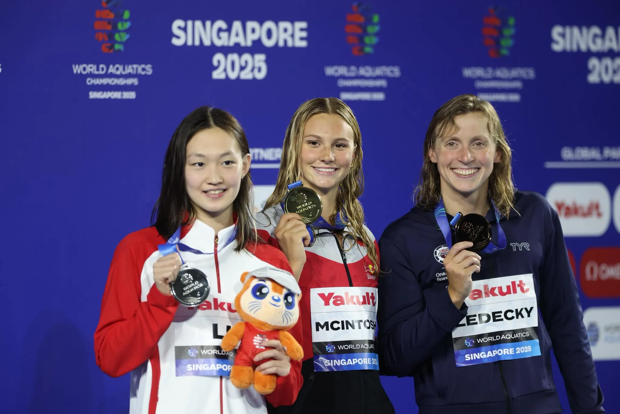 Katie Ledecky on Podium with Teammates at Swimming Championship