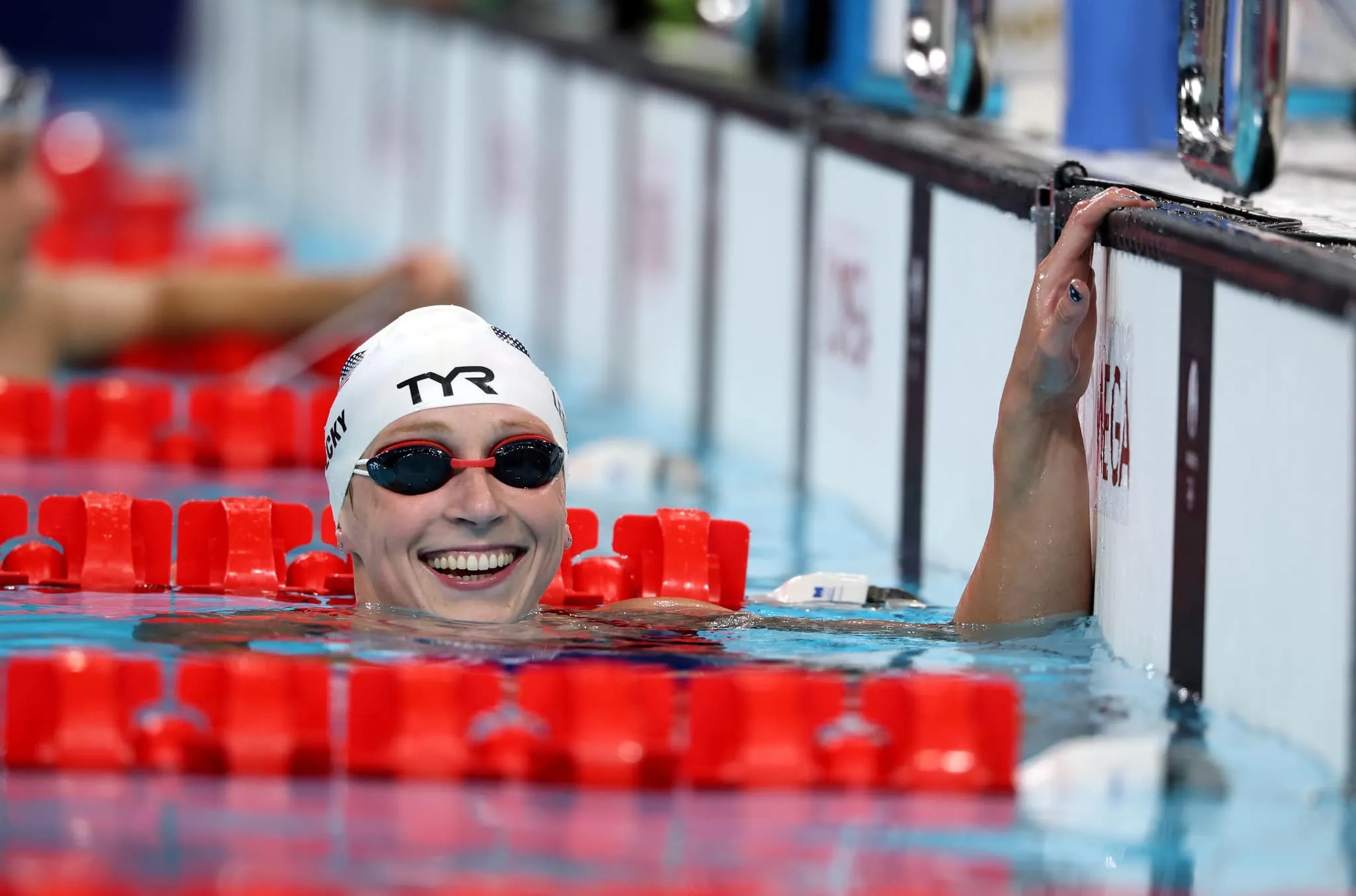 Katie Ledecky Celebrating in Pool After Championship Swimming Win