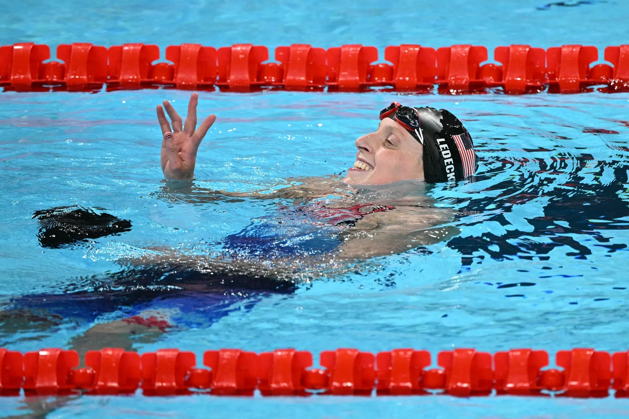 Katie Ledecky Swimming Freestyle with Speed in Competitive Event