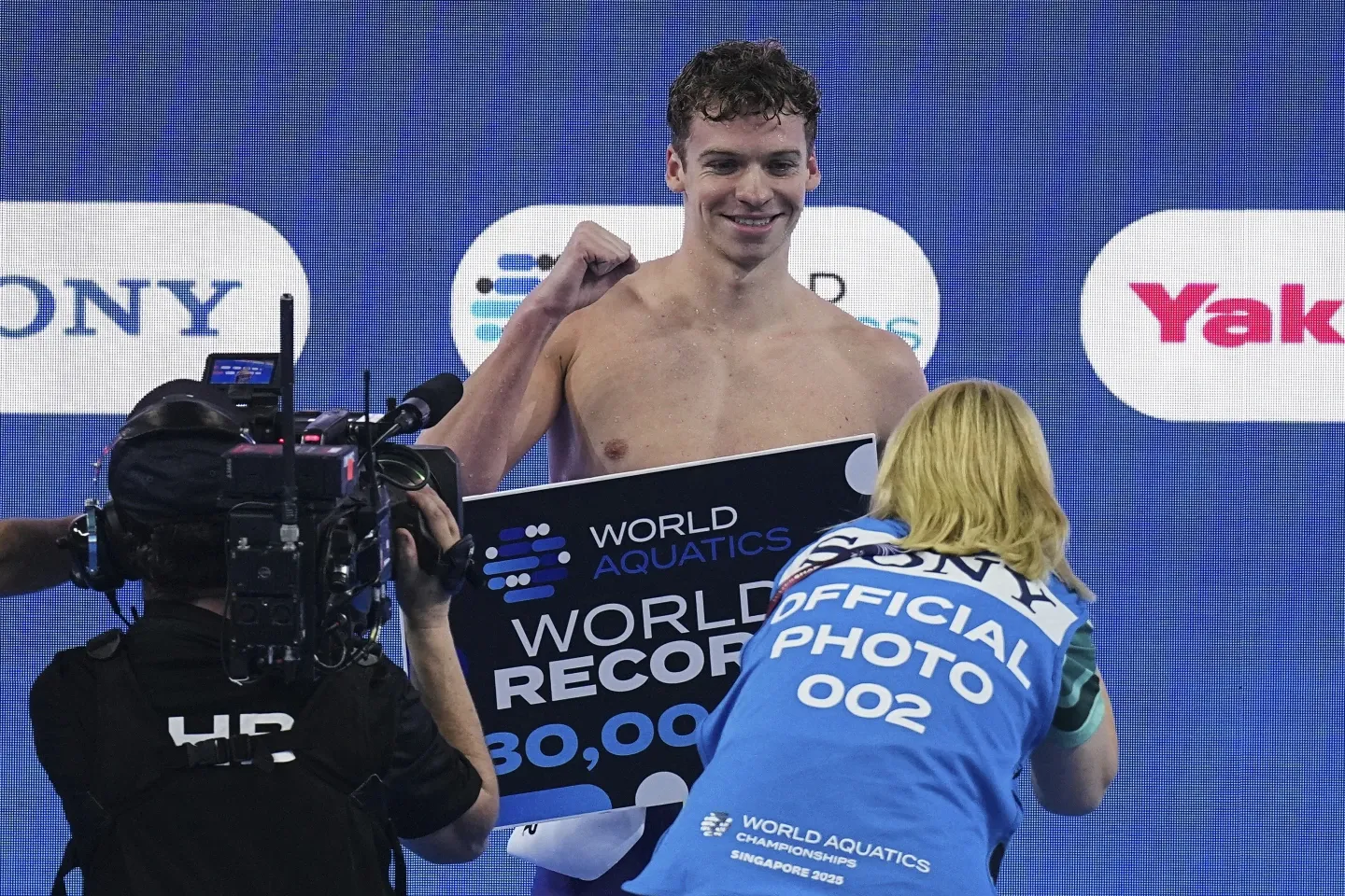 Leon Marchand Celebrating After Winning International Swimming Medal