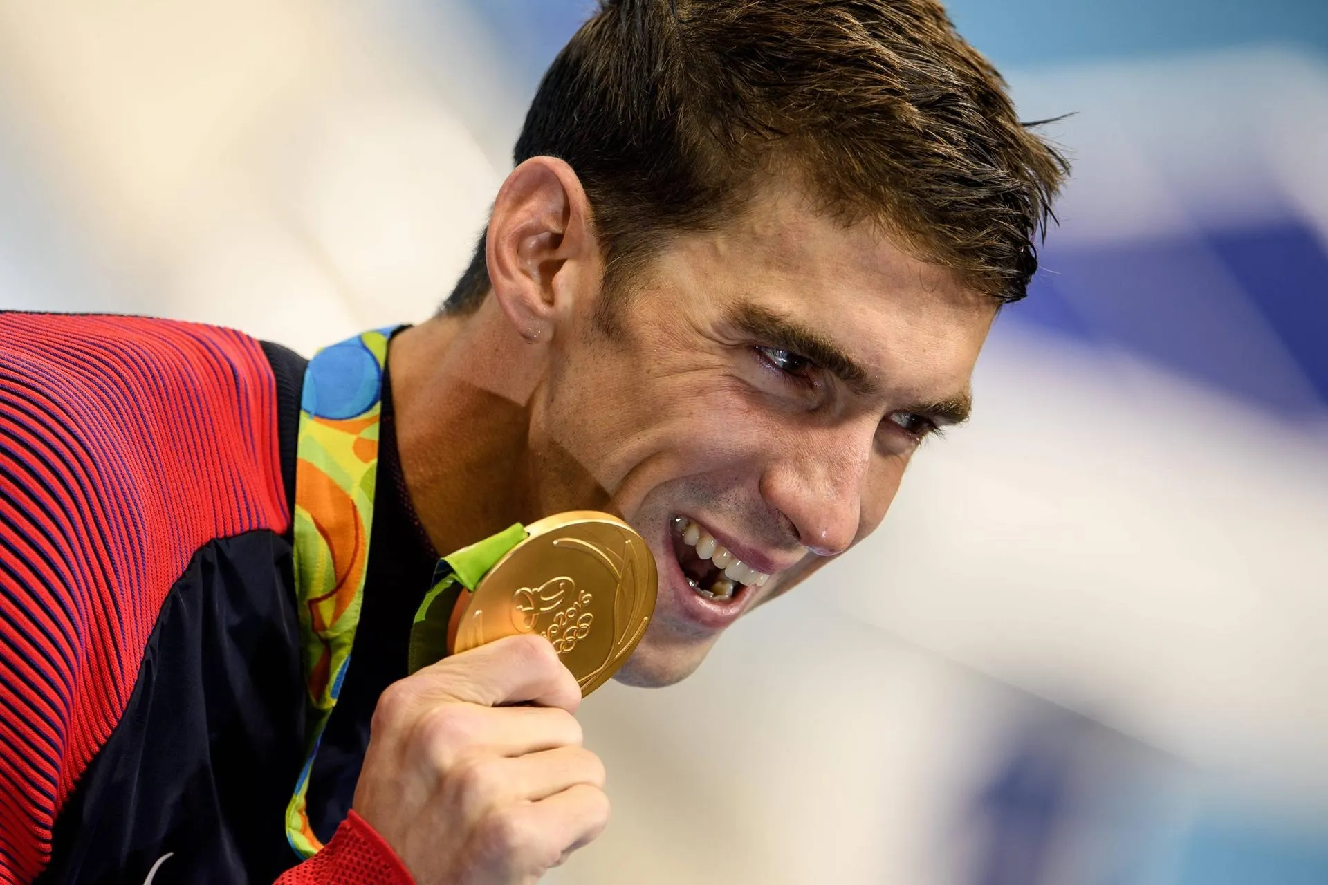 Michael Phelps Smiling With Gold Medal Wallpaper