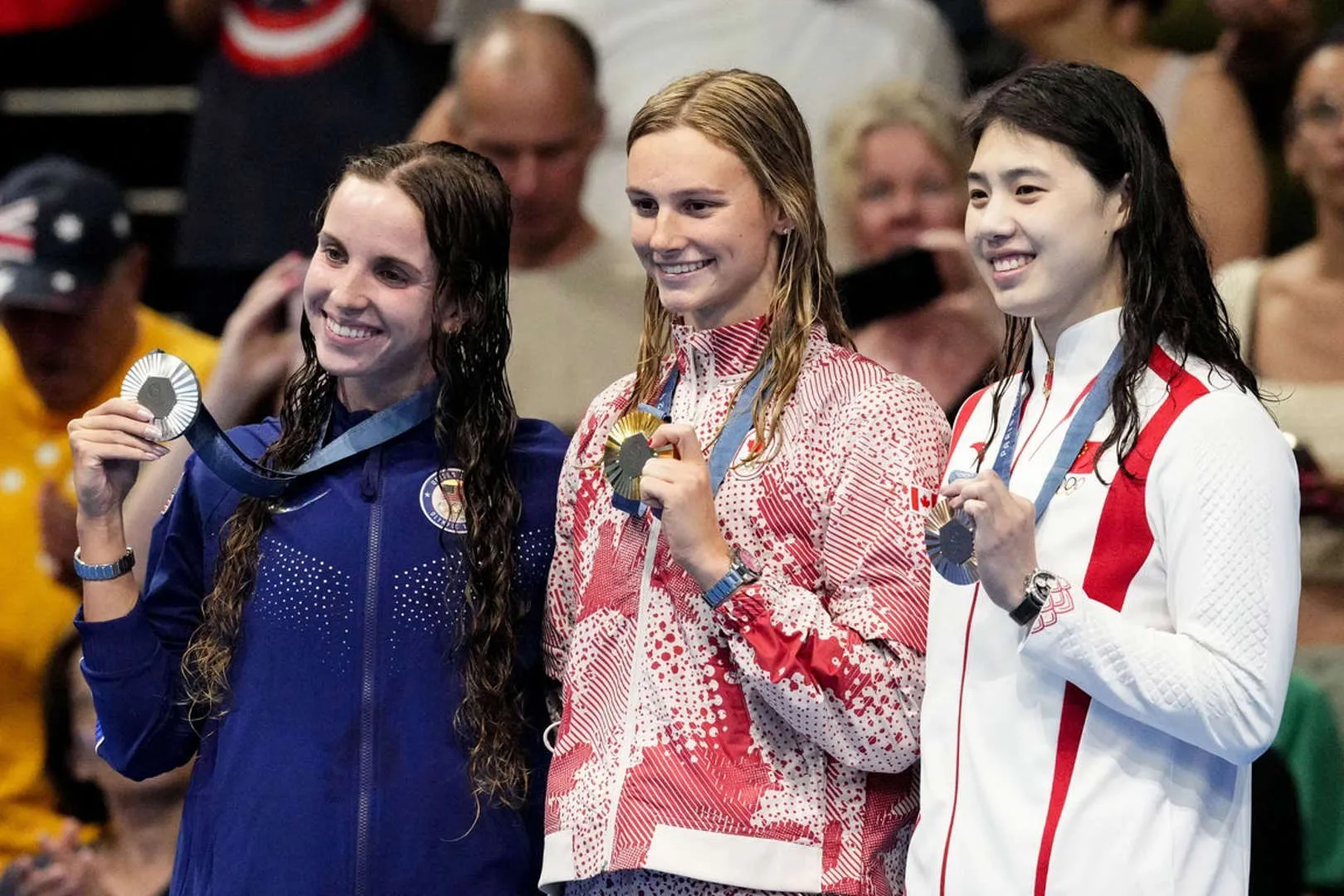 Summer McIntosh Smiling with Family After Swimming Championship Win