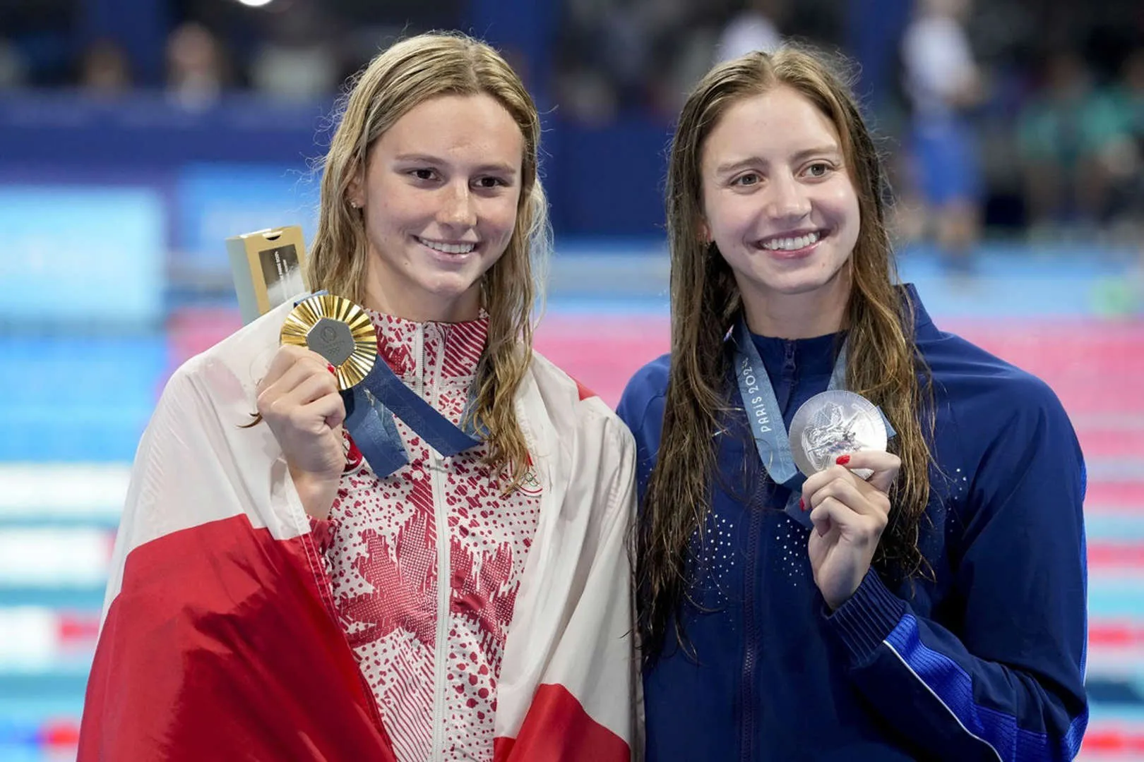Summer McIntosh with Teammate Smiling After Swimming Competition