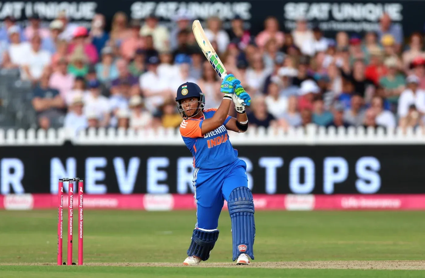 Richa Ghosh Smashes Boundary Shot in Cricket Match