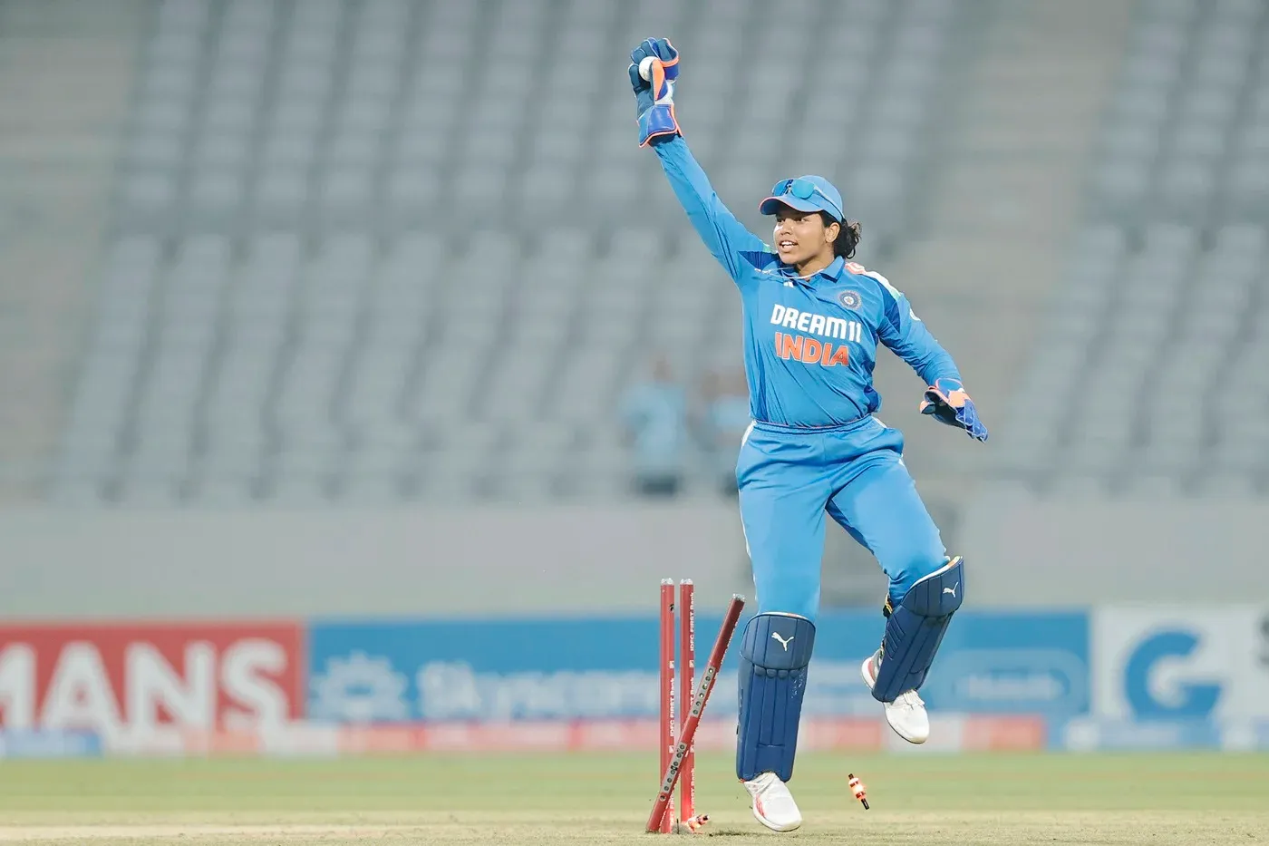 Richa Ghosh Celebrates Successful Stumping with Smile