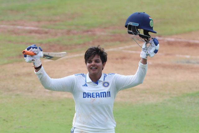 Shafali Verma Celebrates Century with Helmet in Hand