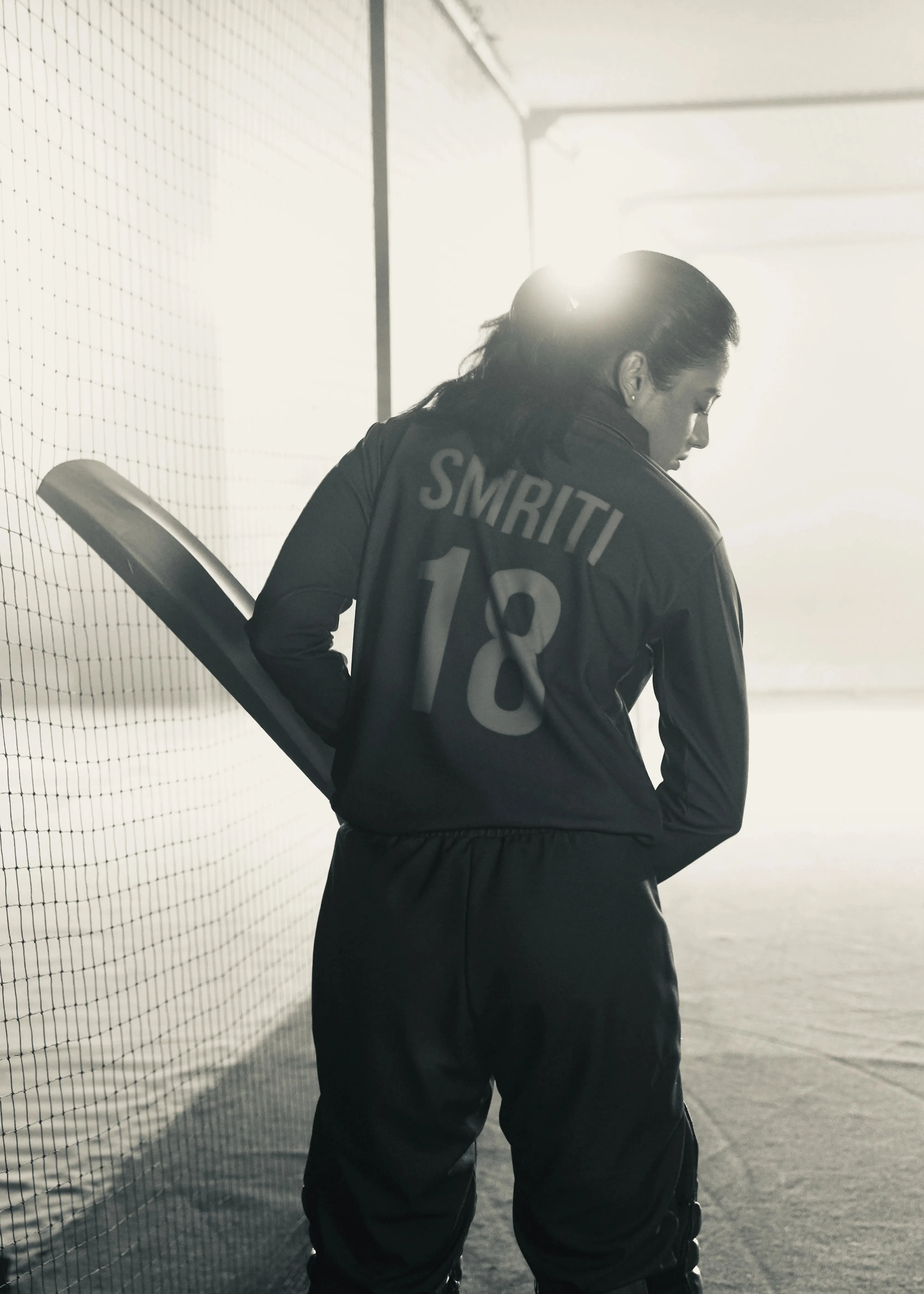 Smriti Mandhana in Hoodie Walking with Cricket Bat