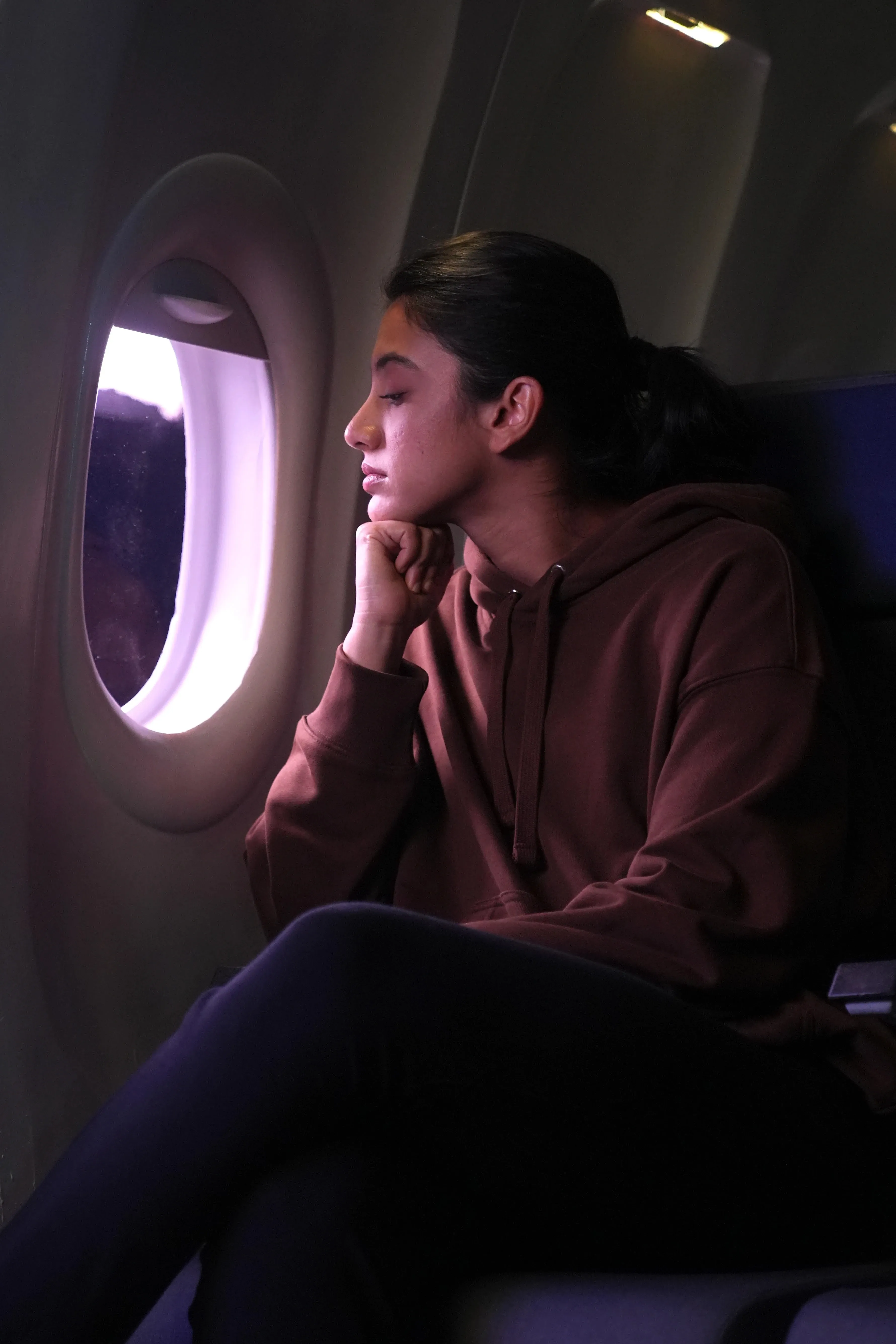 Smriti Mandhana Looks Out Airplane Window in Thought