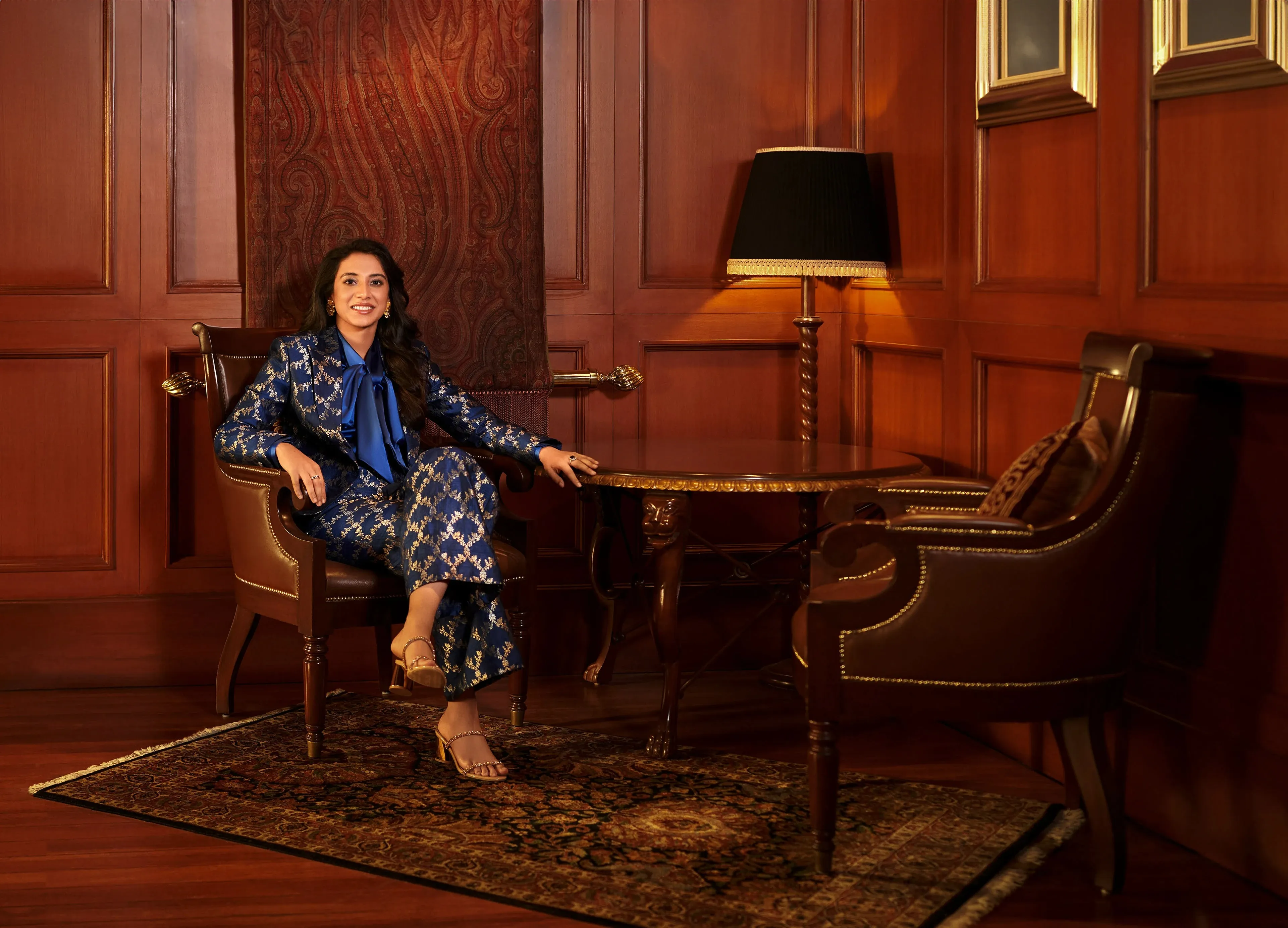 Smriti Mandhana in Elegant Outfit Sitting in Wooden Room