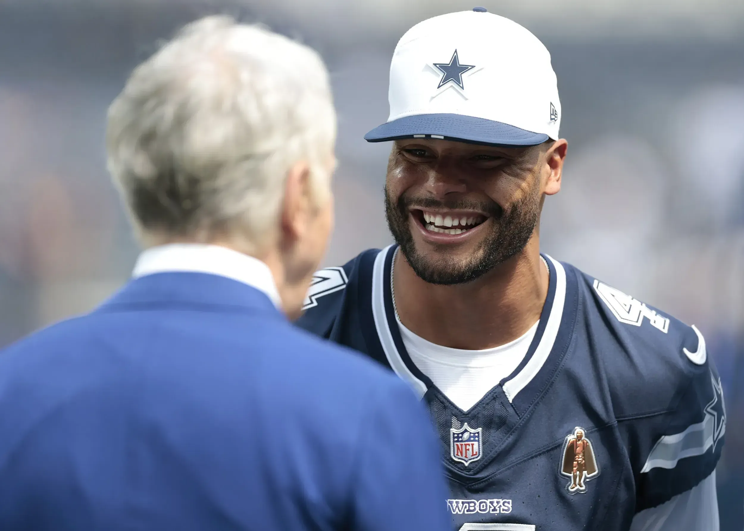 Dak Prescott with Coach