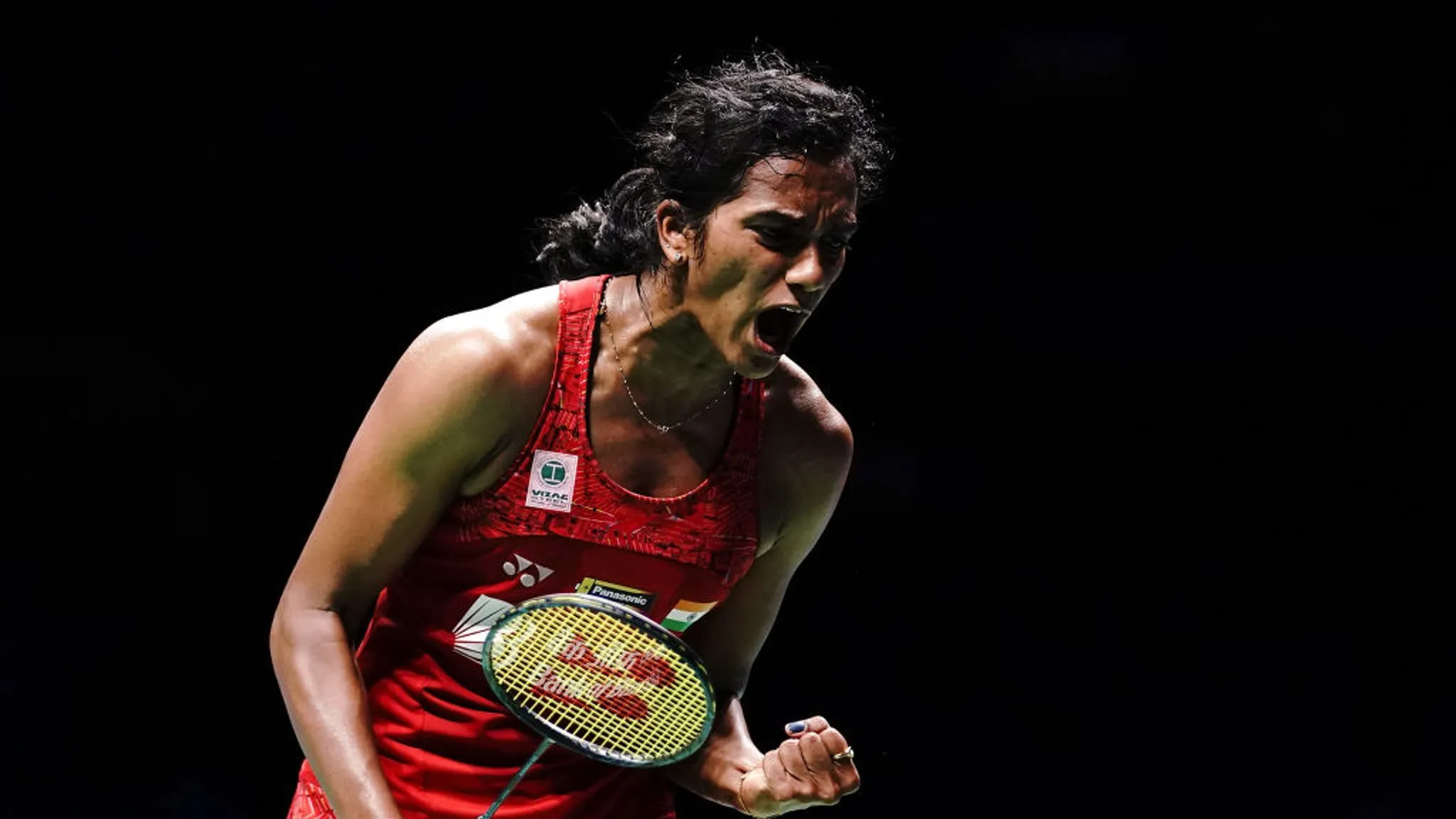 PV Sindhu in Red Badminton Jersey Wallpaper