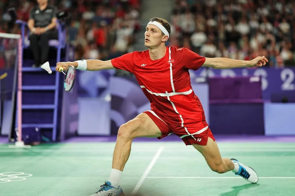 Viktor Axelsen Stretches Wide for Defensive Shot