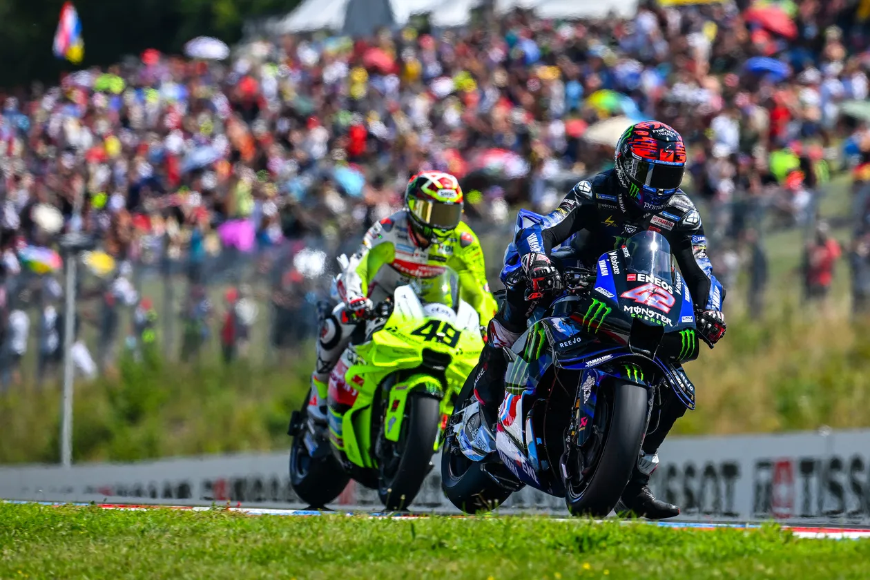 Alex Rins Overtaking Rival in MotoGP Race