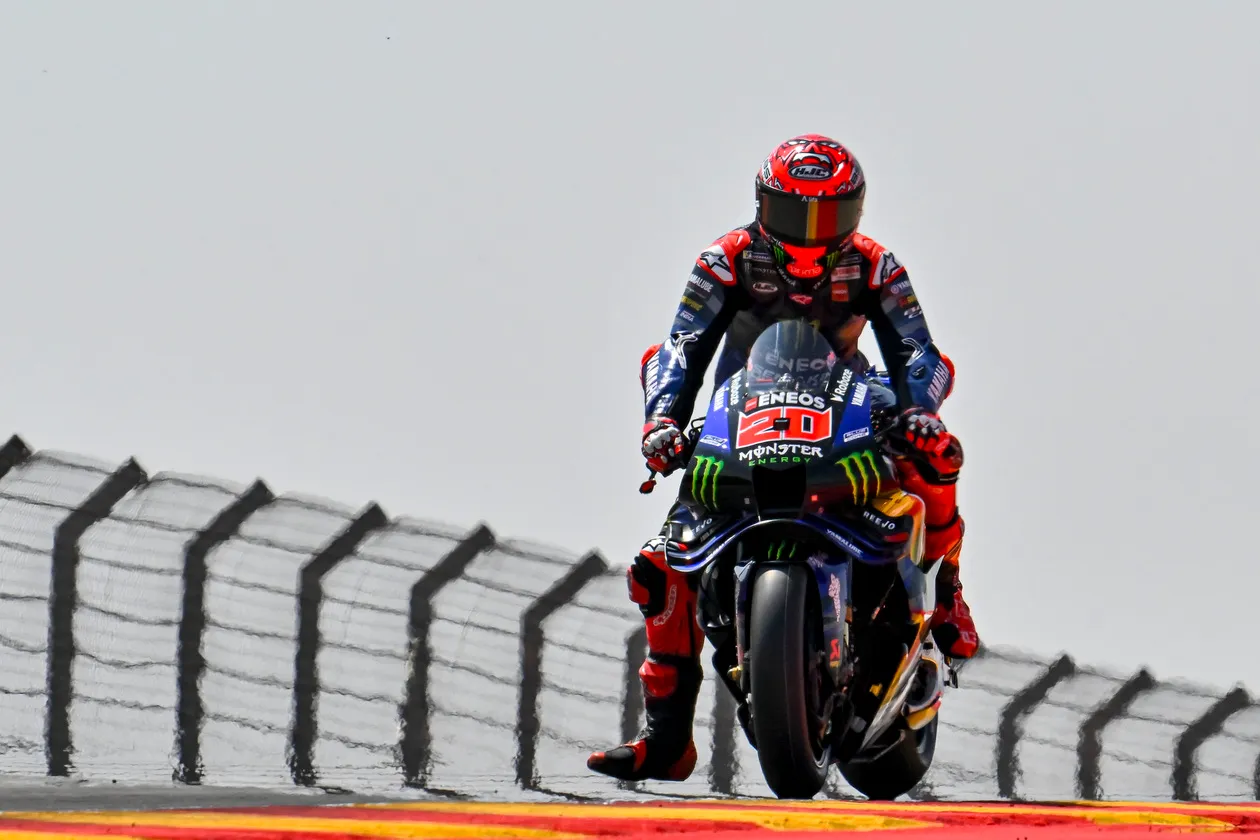 Fabio Quartararo in Red Racing Gear on MotoGP Track