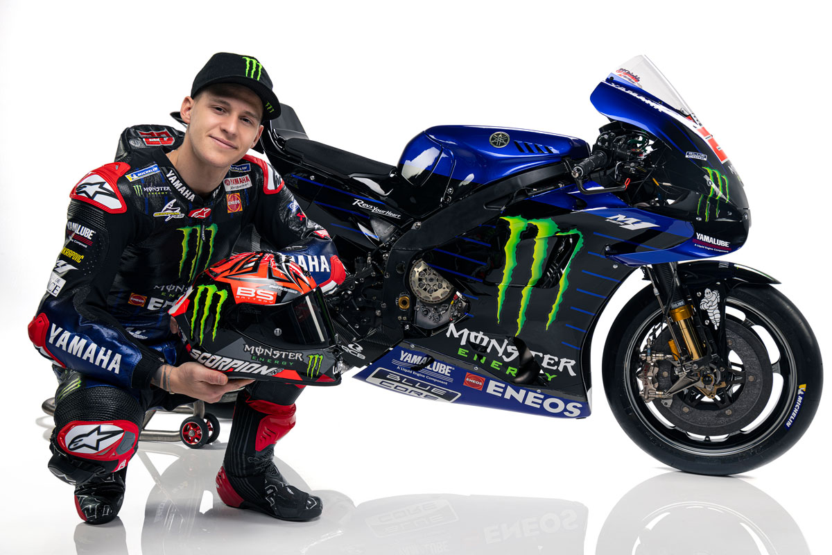 Fabio Quartararo Posing with Yamaha Monster Energy Bike