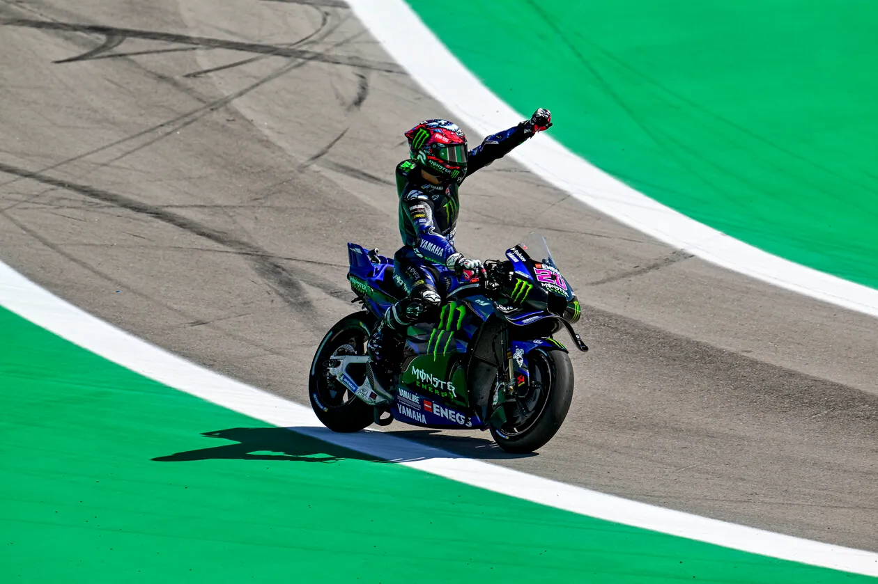 Fabio Quartararo Celebrating Victory on Yamaha Bike