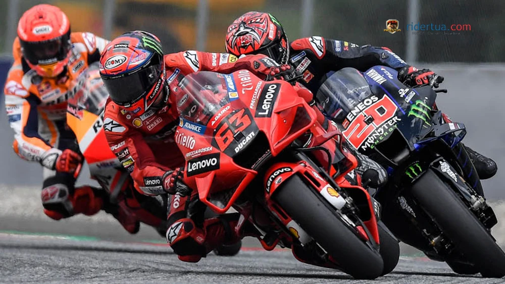 Francesco Bagnaia leading the pack on Ducati at high speed