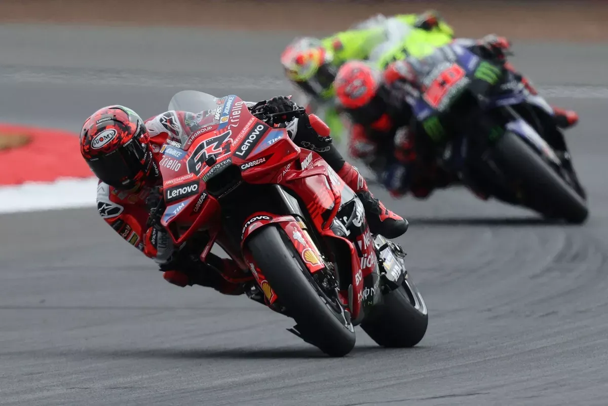 Francesco Bagnaia in a close race with fellow riders