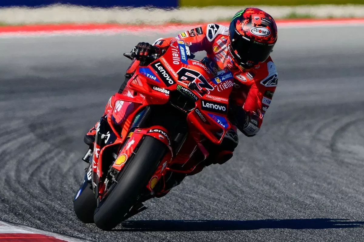 Bagnaia pushing hard through a curve at top speed