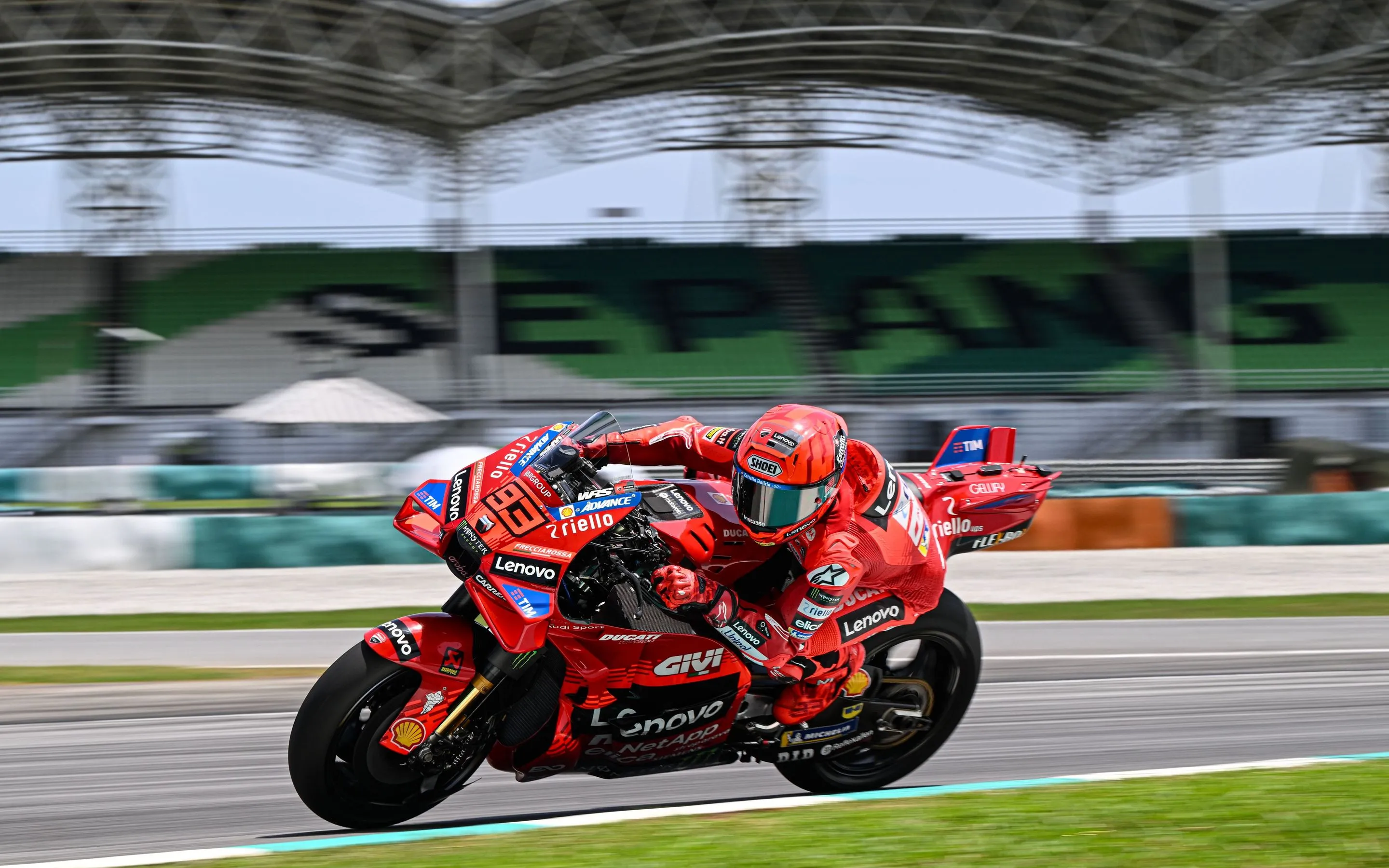 Marc Marquez racing at full speed on Ducati