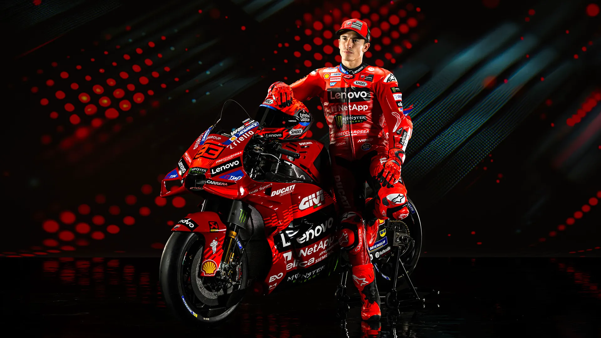 Marc Marquez with Ducati bike in dramatic team shot