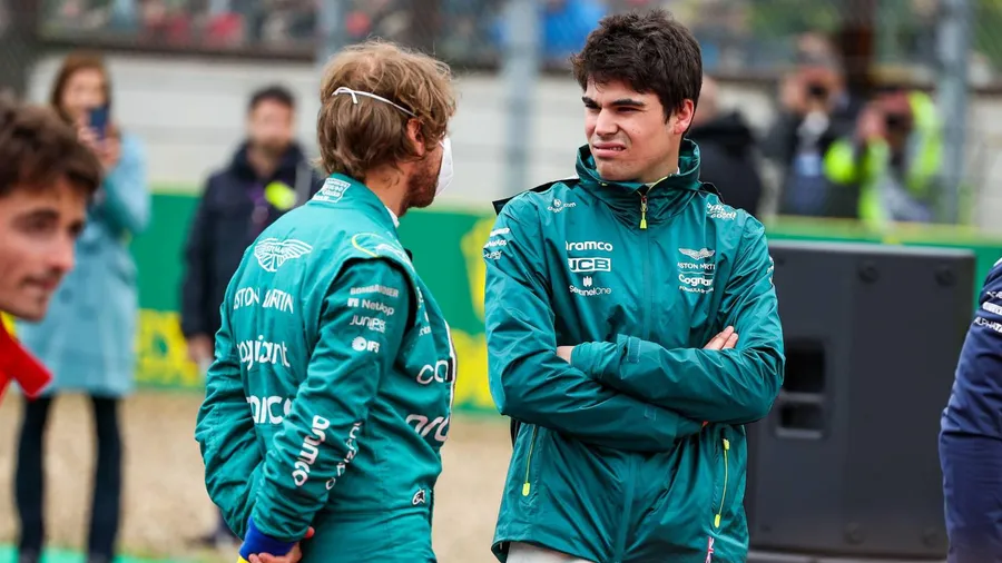 Lance Stroll Discusses with Team
