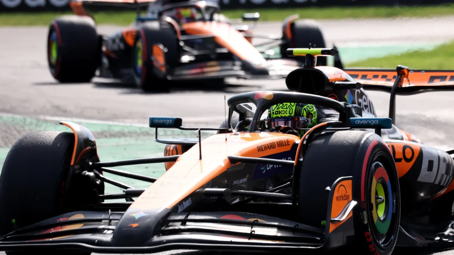 McLaren F1 Car Charges Down the Straight at Full Racing Speed