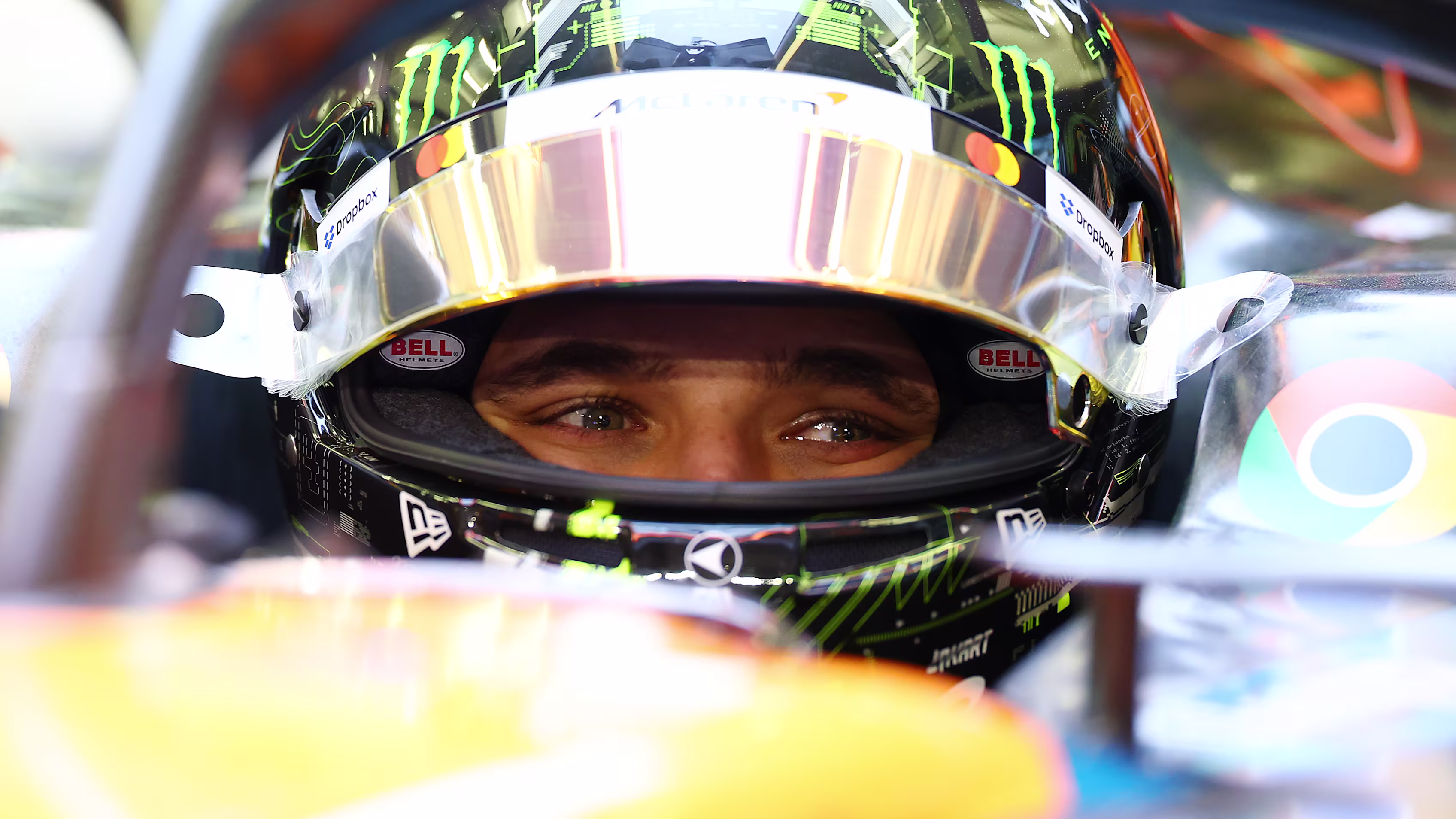 Focused Lando Norris Prepares in Cockpit Before F1 Race Start