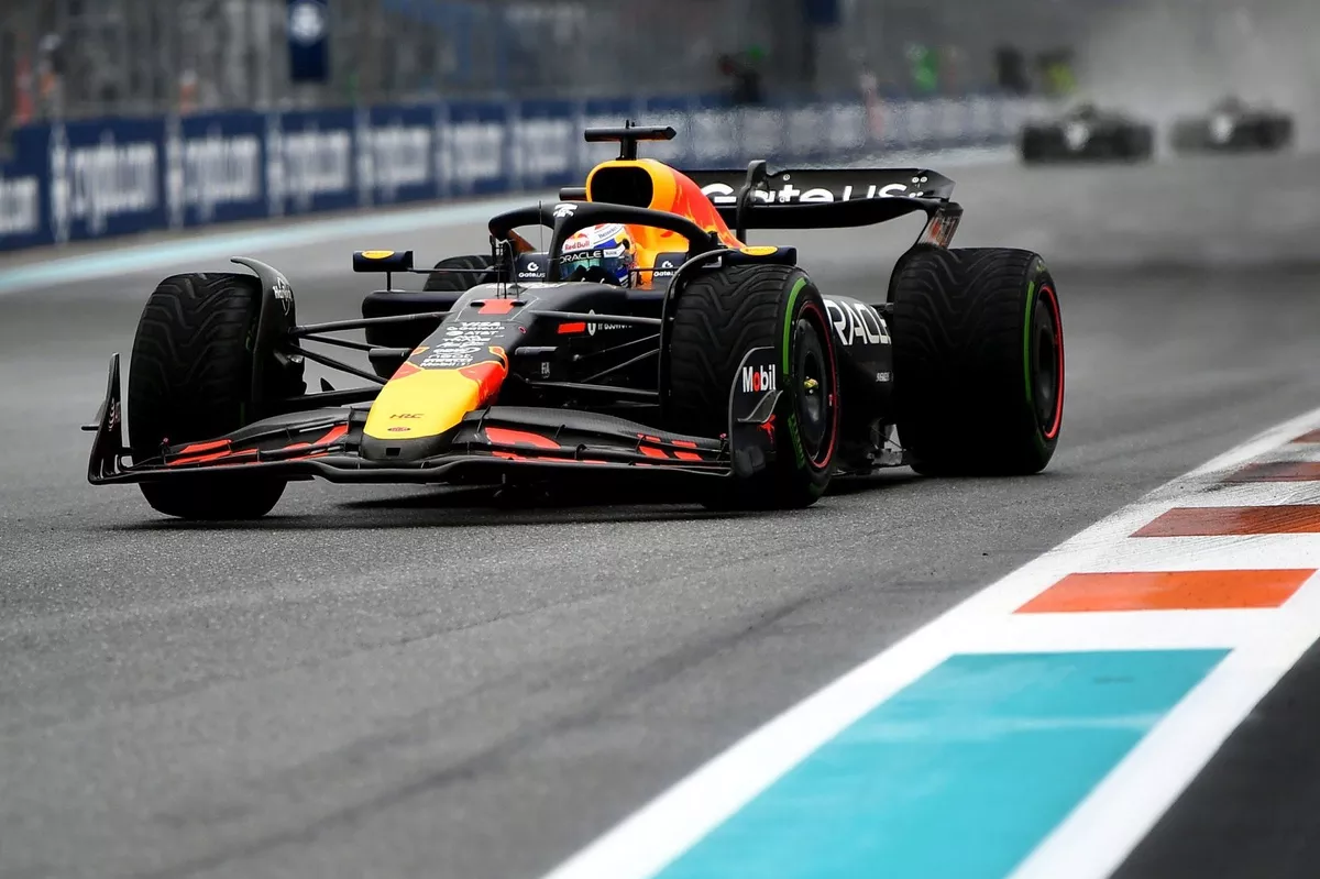 Max Verstappen Racing on a Wet Track